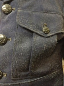 Wool uniform displaying active mould